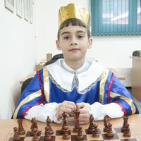 10-летний Женя Немейка стал настоящим королем  (и не только из-за костюма) областного Первенства среди шахматных семей. 